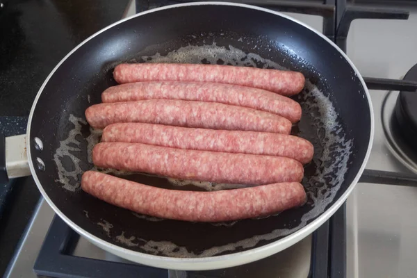 Sausages Grilling Frying Pan Gas Cooker — Foto de Stock