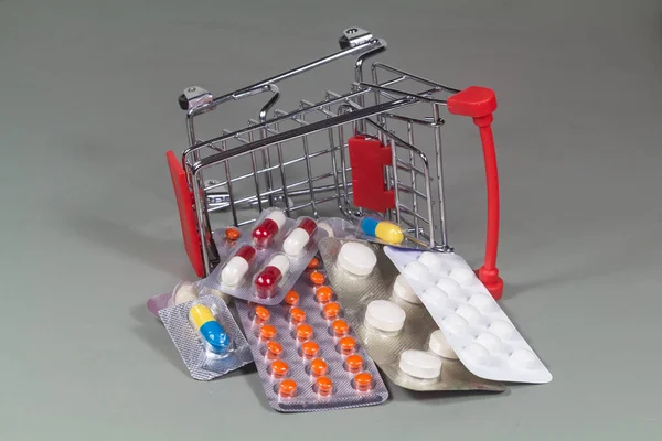 Small Shopping Cart Overturned Pack Pills — Stock Photo, Image