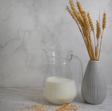 oat milk on wooden background breakfast protein