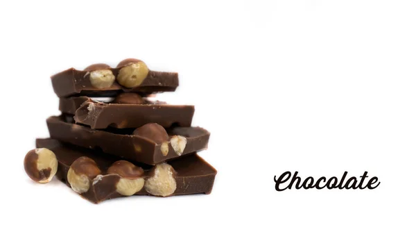 Chocolate Pieces Hazelnuts White Background — Stock Photo, Image