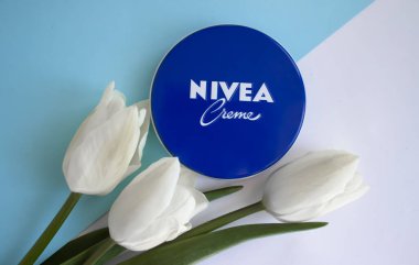 May 4, 2022 Ukraine, Kyiv city cream Nivea with tulips