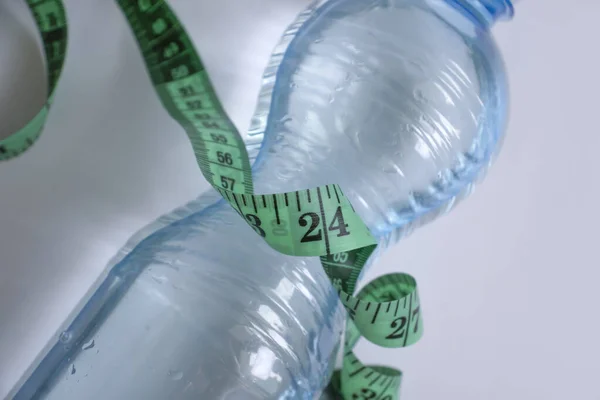 Bottle Water Centimeter Tape Light Background — Stock Photo, Image