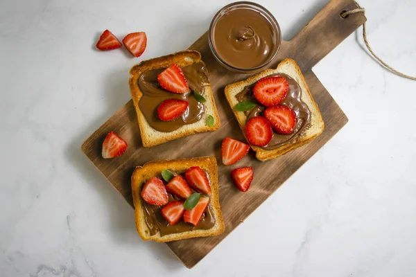 Bread Chocolate Paste Strawberries Light Background — Stock Photo, Image