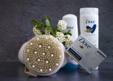 May 19, 2022 Ukraine city Kyiv mfo, shampoo from the Nivea company, a flower on a dark background