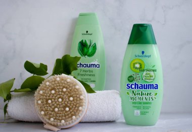 May 15, 2022 Ukraine city Kiev Schauma shampoo from Schwarzkopf company, massage brush, towel