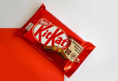 May 3, 2022 Ukraine city Kyiv chocolate bar Kit Kat on a colored background