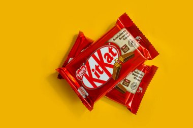 May 3, 2022 Ukraine city Kyiv chocolate bar Kit Kat on a colored background