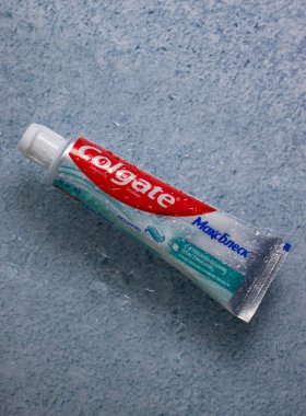 May 22, 2022 Ukraine city Kyiv Colgate toothpaste on a light background