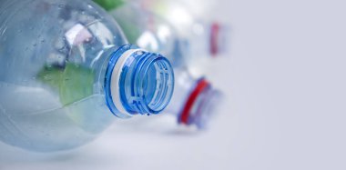 Used plastic bottle on a light background