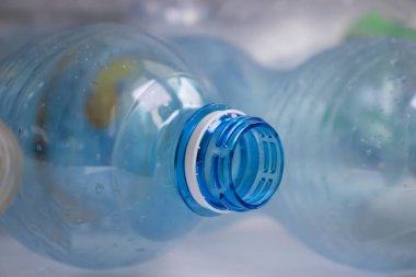 Used plastic bottle on a light background
