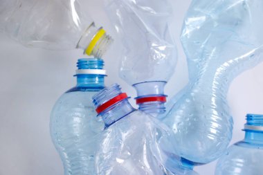 Used plastic bottle on a light background