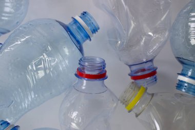 Used plastic bottle on a light background