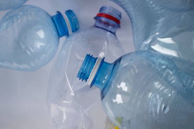 Used plastic bottle on a light background