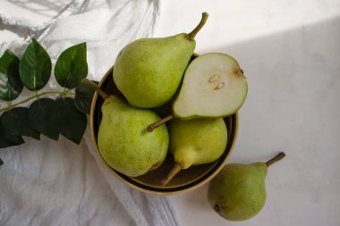 Fresh pear plate on light background