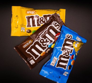 March 29, 2022 Ukraine city Kyiv chocolate M and Ms on a dark background