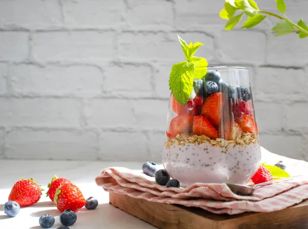 Yogurt Chia Seeds Raspberries Strawberries Blueberries Mint Light Background — Fotografia de Stock