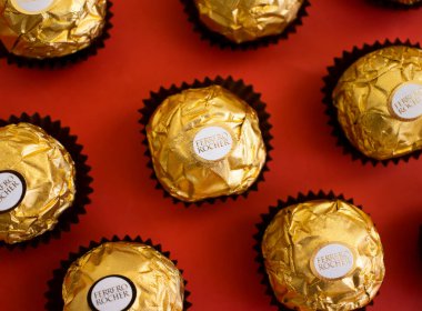 September 7, 2022 Ukraine city Kyiv candy Ferrero Rocher on a colored background