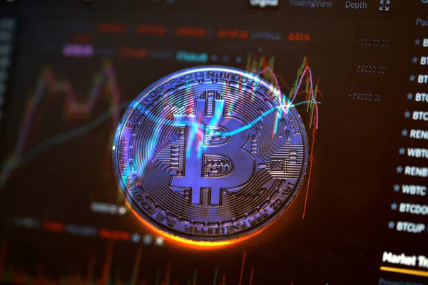 Cryptocurrency coin and financial stock market data — Stockfoto