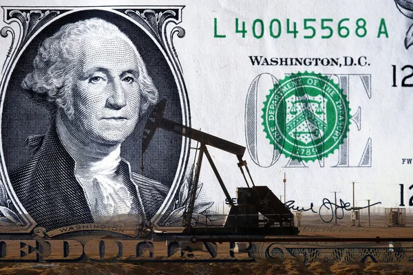 Oil rig and a US dollar bill — Stock Photo, Image