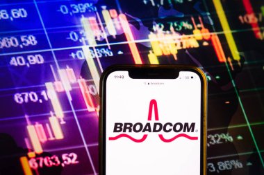 KONSKIE, POLAND - August 07, 2022: Smartphone displaying logo of Broadcom Inc on stock exchange diagram background
