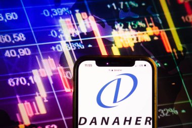 KONSKIE, POLAND - August 07, 2022: Smartphone displaying logo of Danaher Corporation on stock exchange diagram background