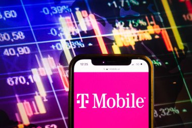 KONSKIE, POLAND - August 07, 2022: Smartphone displaying logo of T-Mobile US Inc on stock exchange diagram background