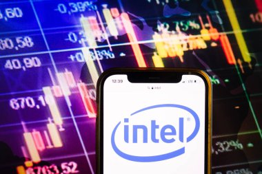 KONSKIE, POLAND - August 07, 2022: Smartphone displaying logo of Intel Corporation on stock exchange diagram background