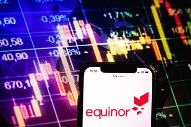 KONSKIE, POLAND - August 09, 2022: Smartphone displaying logo of Equinor company on stock exchange diagram background