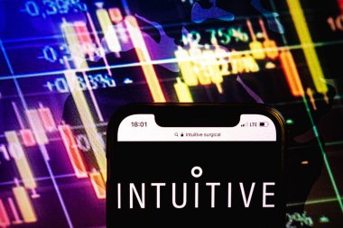 KONSKIE, POLAND - August 09, 2022: Smartphone displaying logo of Intuitive Surgical company on stock exchange diagram background