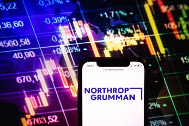 KONSKIE, POLAND - August 09, 2022: Smartphone displaying logo of Northrop Grumman company on stock exchange diagram background