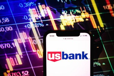 KONSKIE, POLAND - August 09, 2022: Smartphone displaying logo of US Bancorp company on stock exchange diagram background