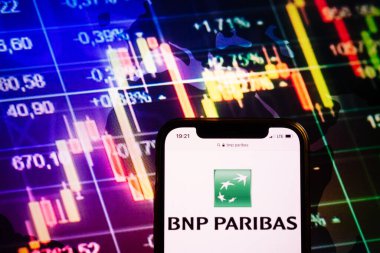 KONSKIE, POLAND - August 10, 2022: Smartphone displaying logo of BNP Paribas company on stock exchange diagram background