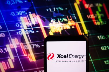 KONSKIE, POLAND - September 04, 2022: Smartphone displaying logo of Xcel Energy company on stock exchange diagram background