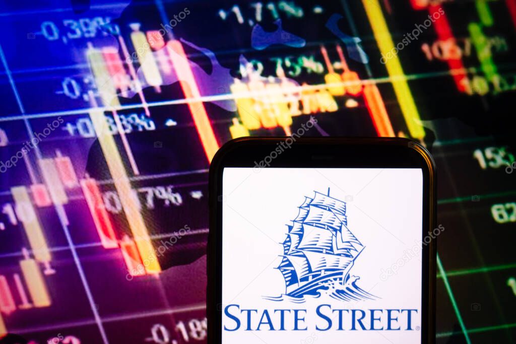 KONSKIE, POLAND - September 10, 2022: Smartphone displaying logo of State Street Corporation company on stock exchange diagram background