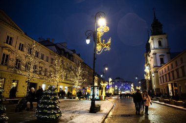 5 of December 2021 Warsaw, Poland. Nowy Swiat street. Festive Christmas illumination. Central street.