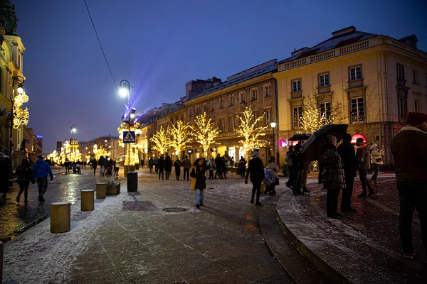 5 of December 2021 Warsaw, Poland. Nowy Swiat street. Festive Christmas illumination. Central street.