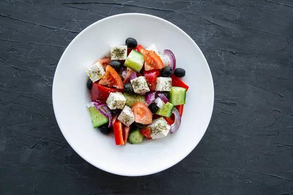 Fresh Tasty Greek Salad Black Stone Concrete Background Top View — Stock Photo, Image