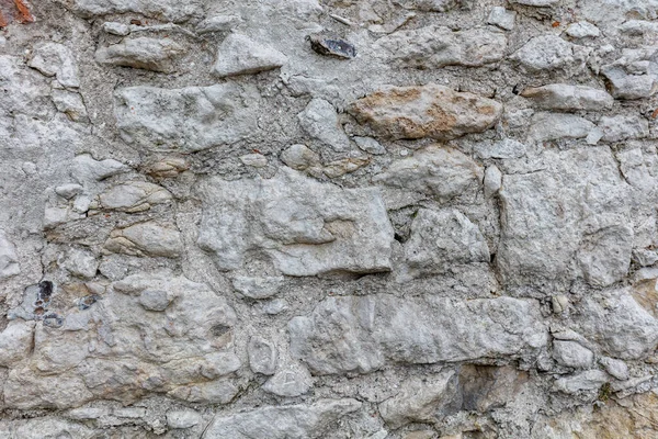 Gamla Ruinerade Murverk Grå Natursten Olika Storlekar Och Former Bakgrund — Stockfoto