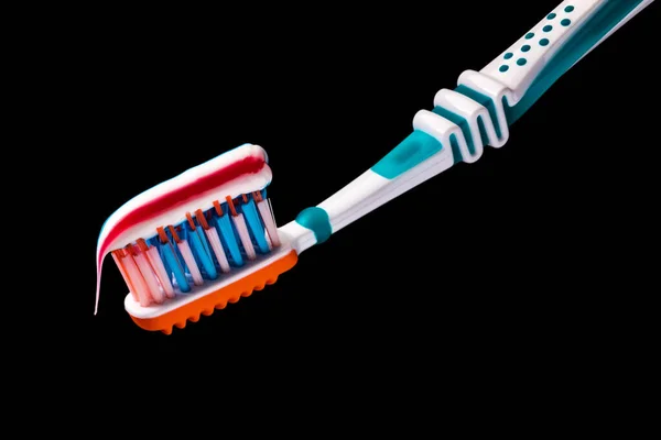 White Plastic Toothbrush Blue Orange Pads White Blue Orange Bristles — Stock Photo, Image