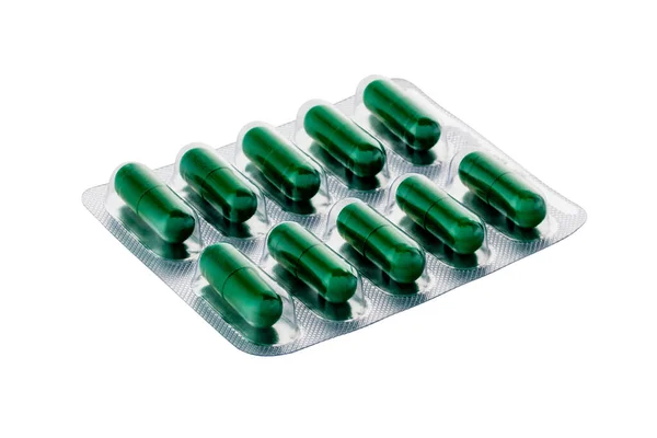 Yeşil kapsüllü gümüş renkli kabarcıklar, beyaz arka planda izole edilmiş. Hızlı seçim için kırpma yolu var. Desing için.