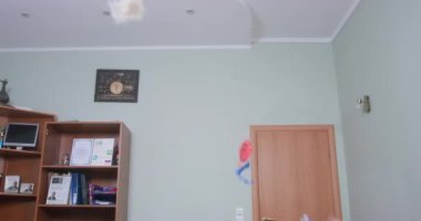 Mischievous students started making a mess, throwing around improvised objects and behaving badly as soon as teacher left classroom. Troubled teenagers and children at school