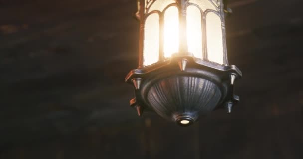 Bright Lantern Hangs Ceiling Swinging Rolling Pirate Ship Illuminating Cabin — Stock Video
