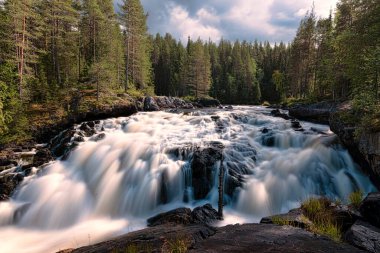 Kumi-threshold waterfall North Karelia Russia clipart
