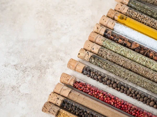 Various Dry Spices Glass Tubes Textured Background Copy Space — Stock Photo, Image