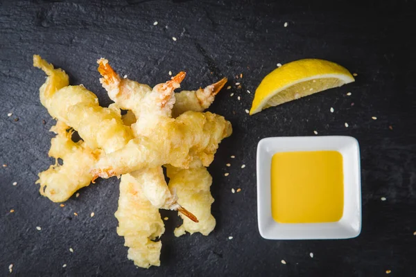 Huge tiger prawns, fried in tempura batter, a favourite Japanese dish.