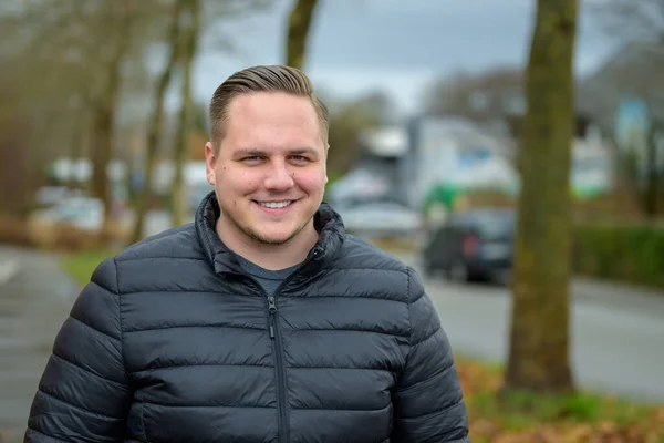 Smiling Friendly Young Man Standing Urban Street Wearing Warm Jacket — Stock Photo, Image