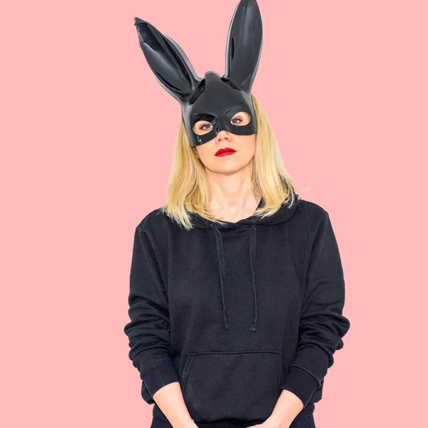 Serious Blond Woman Wearing Rabbit Mask Big Bunny Ears Standing — Fotografia de Stock