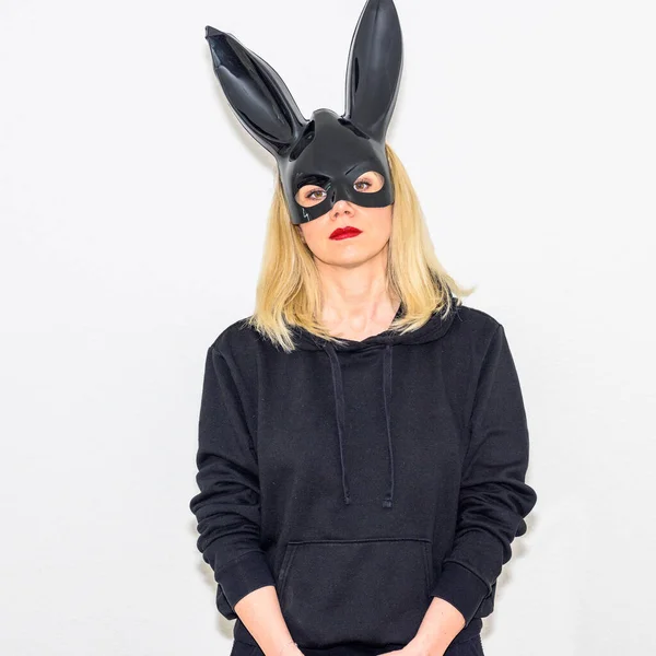 Serious Blond Woman Wearing Rabbit Mask Big Bunny Ears Standing — 스톡 사진