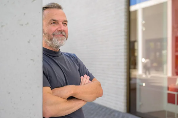 Relaxed Middle Aged Man Standing Watching Amused Smile Leans Wall — Fotografia de Stock