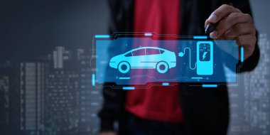Choosing an electric vehicle. electric car choice. pointing at symbol on charging machine. electric car production